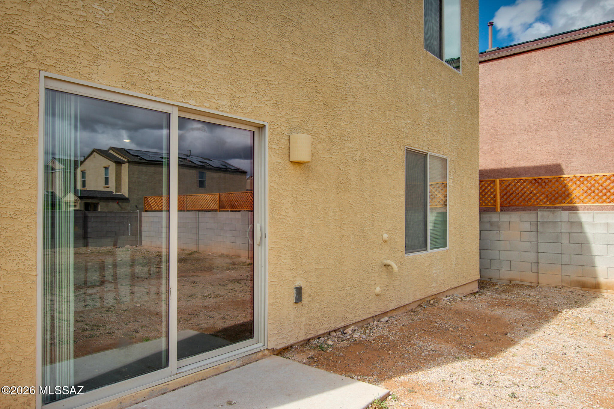 5987 South Antrim Loop Tucson, AZ 85706 - Photo 29 of 34 a view of a glass door with a glass door
