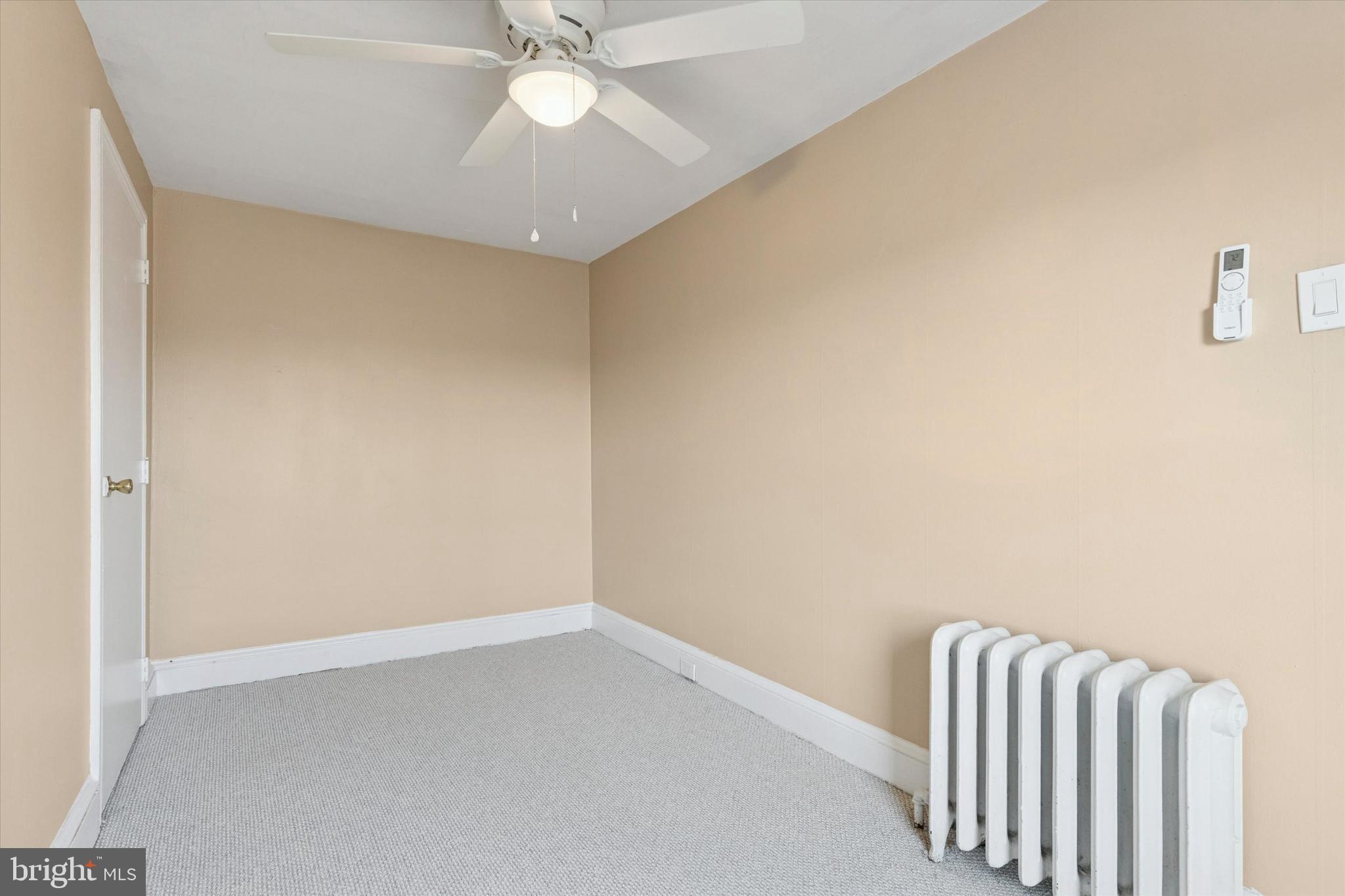 206 Ripka Street, Unit 2 Philadelphia, PA 19127 - Photo 12 of 15 a view of room with staircase and white walls