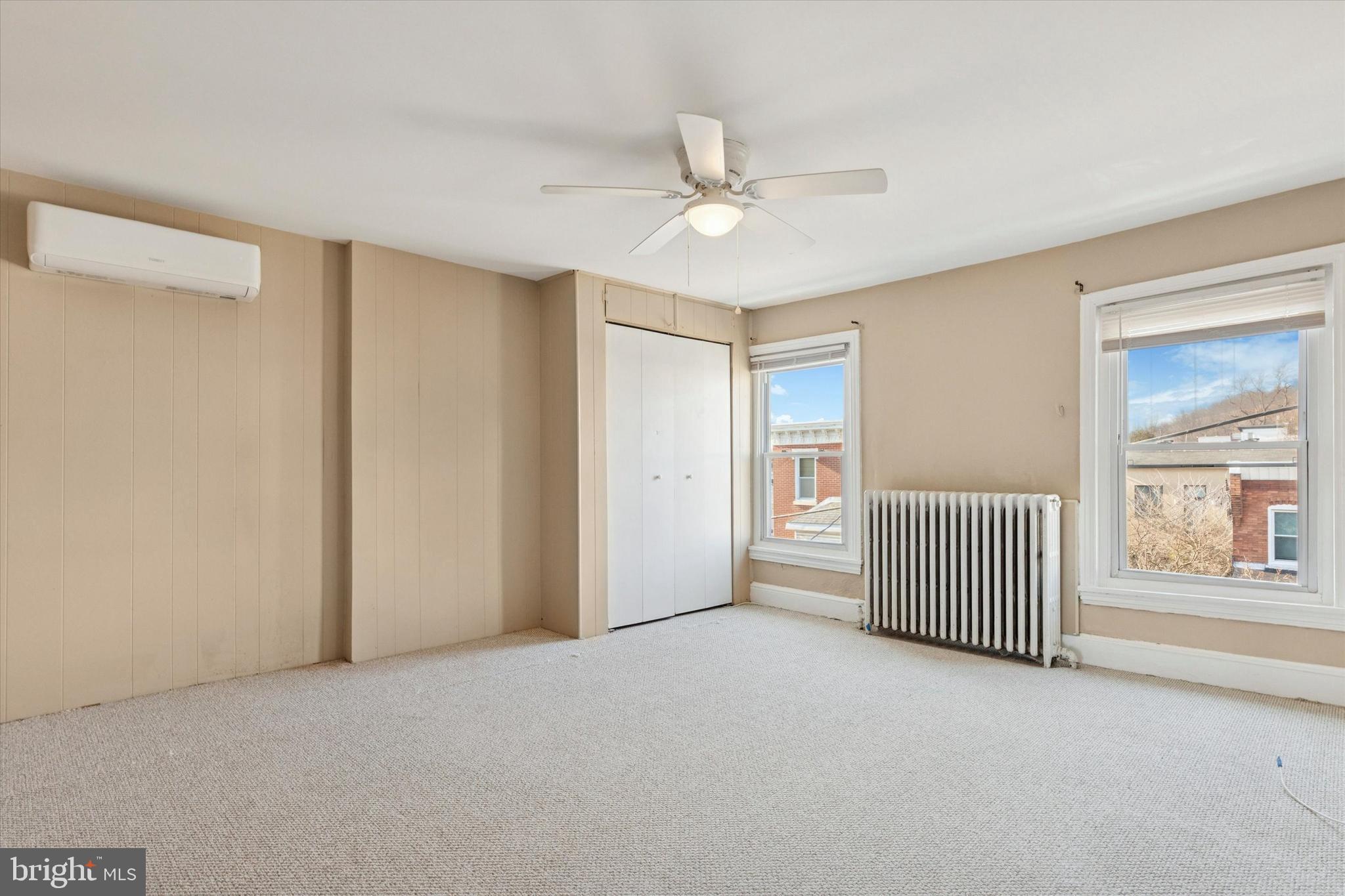 206 Ripka Street, Unit 2 Philadelphia, PA 19127 - Photo 13 of 15 a view of a livingroom with a ceiling fan and window