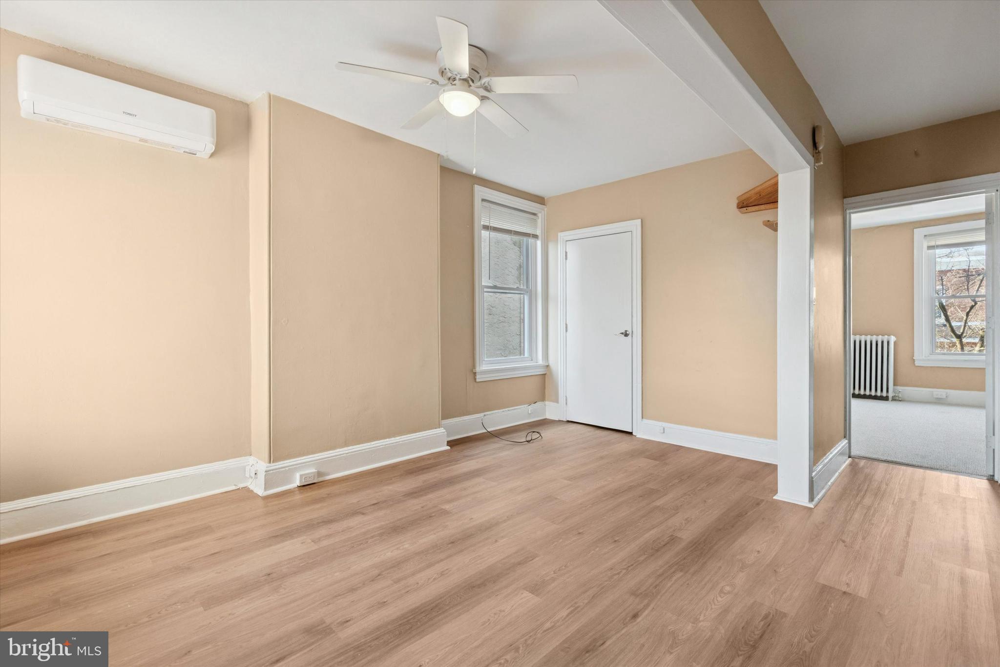 206 Ripka Street, Unit 2 Philadelphia, PA 19127 - Photo 7 of 15 a view of an empty room with wooden floor