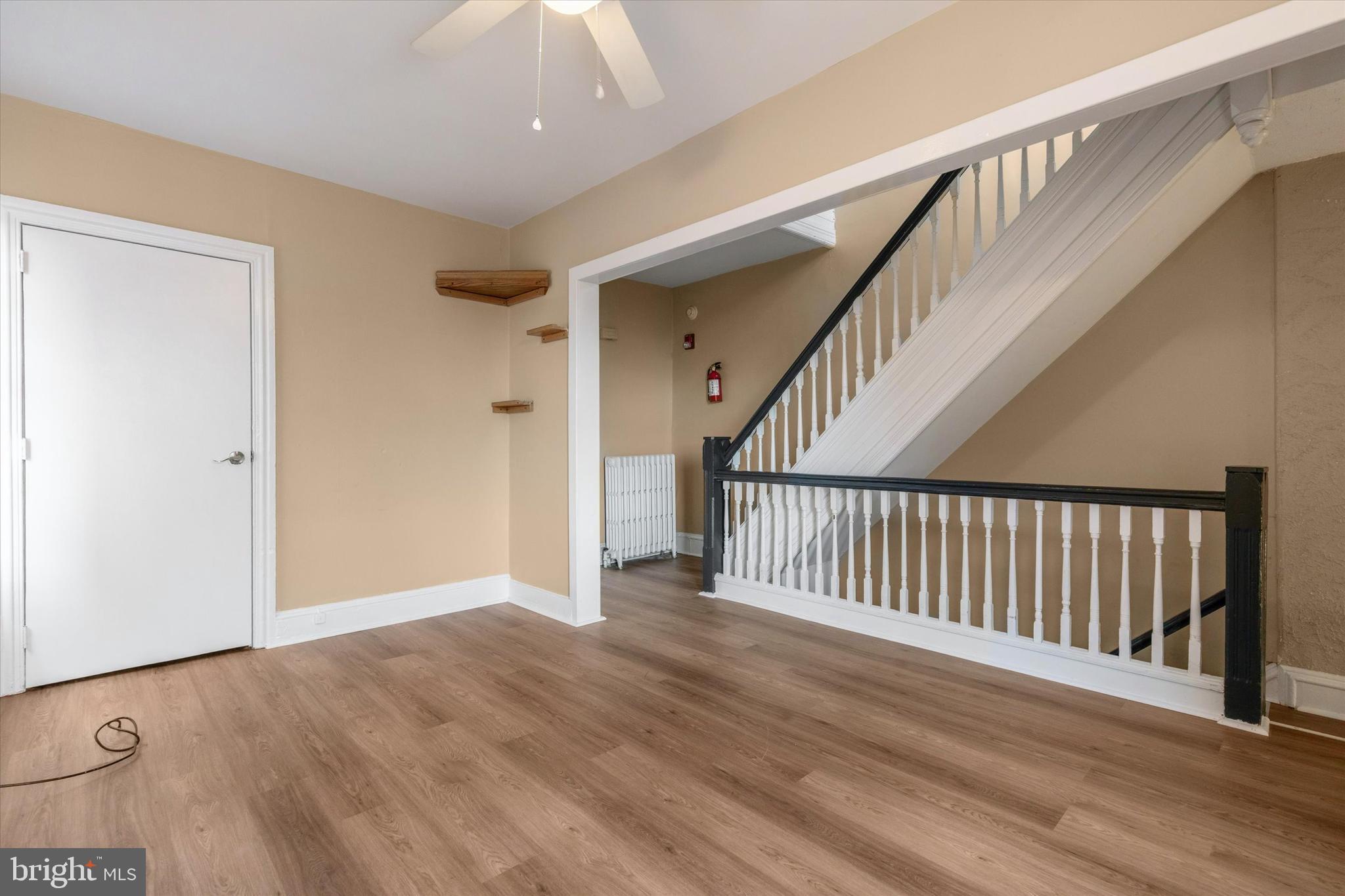206 Ripka Street, Unit 2 Philadelphia, PA 19127 - Photo 8 of 15 a view of a hallway with wooden floor and entryway