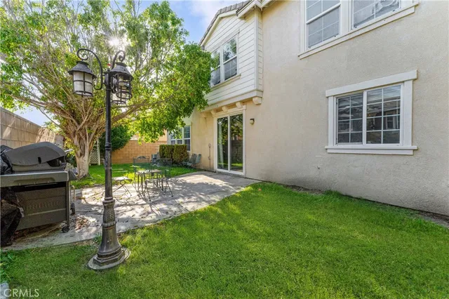 a house view with a outdoor space