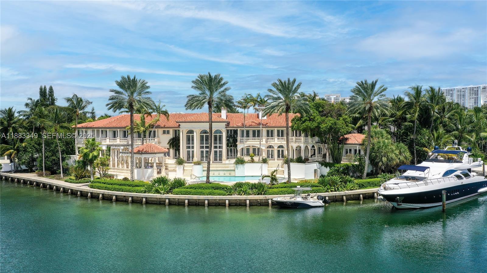 260 Cape Florida Drive Key Biscayne, FL 33149 - Photo 3 of 24 a house with swimming pool in front of it