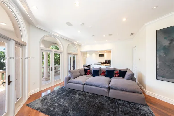a living room with furniture and a rug
