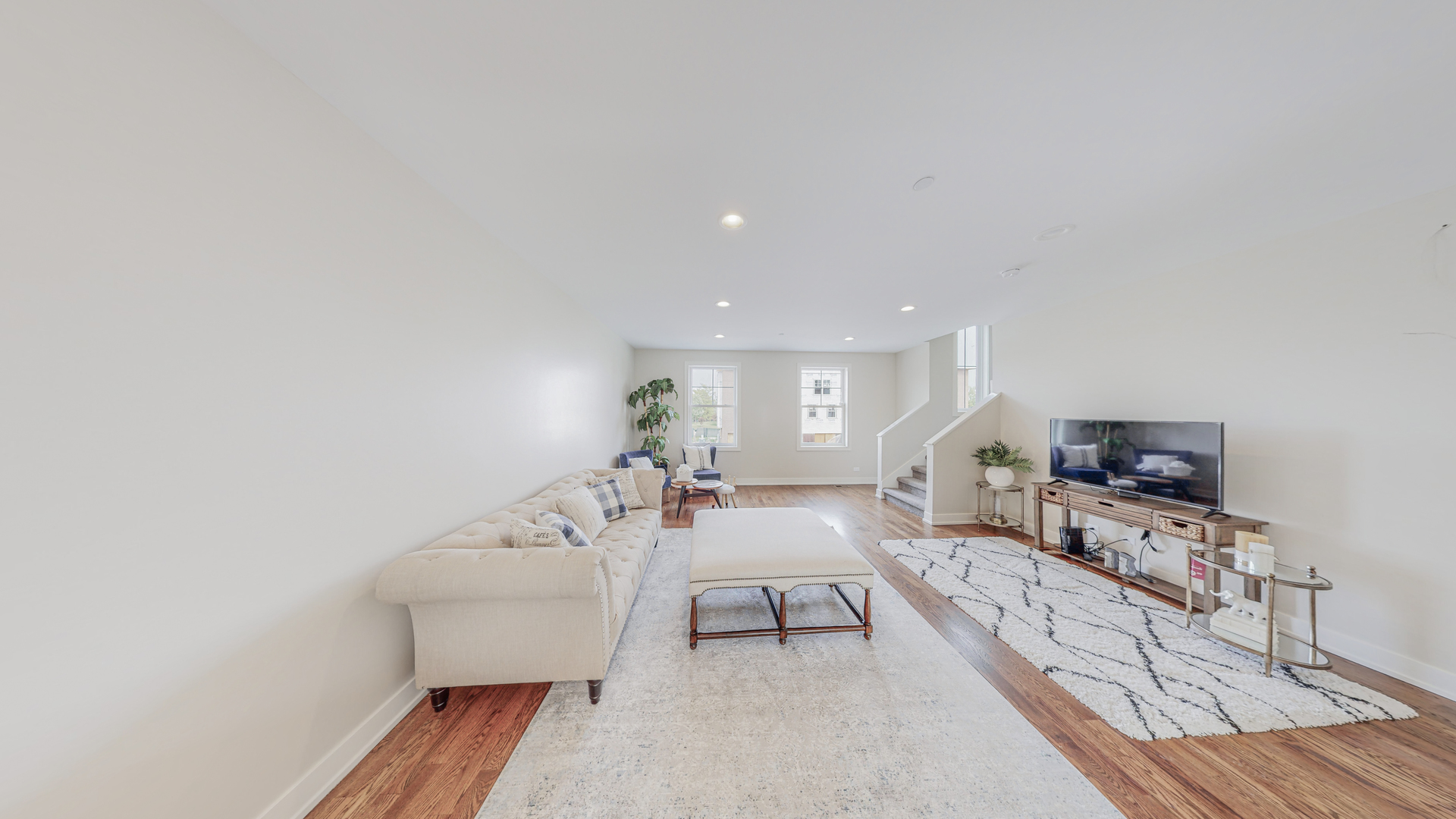 521 Highlands Parkway Itasca, IL 60143 - Photo 11 of 22 a living room with furniture and a flat screen tv