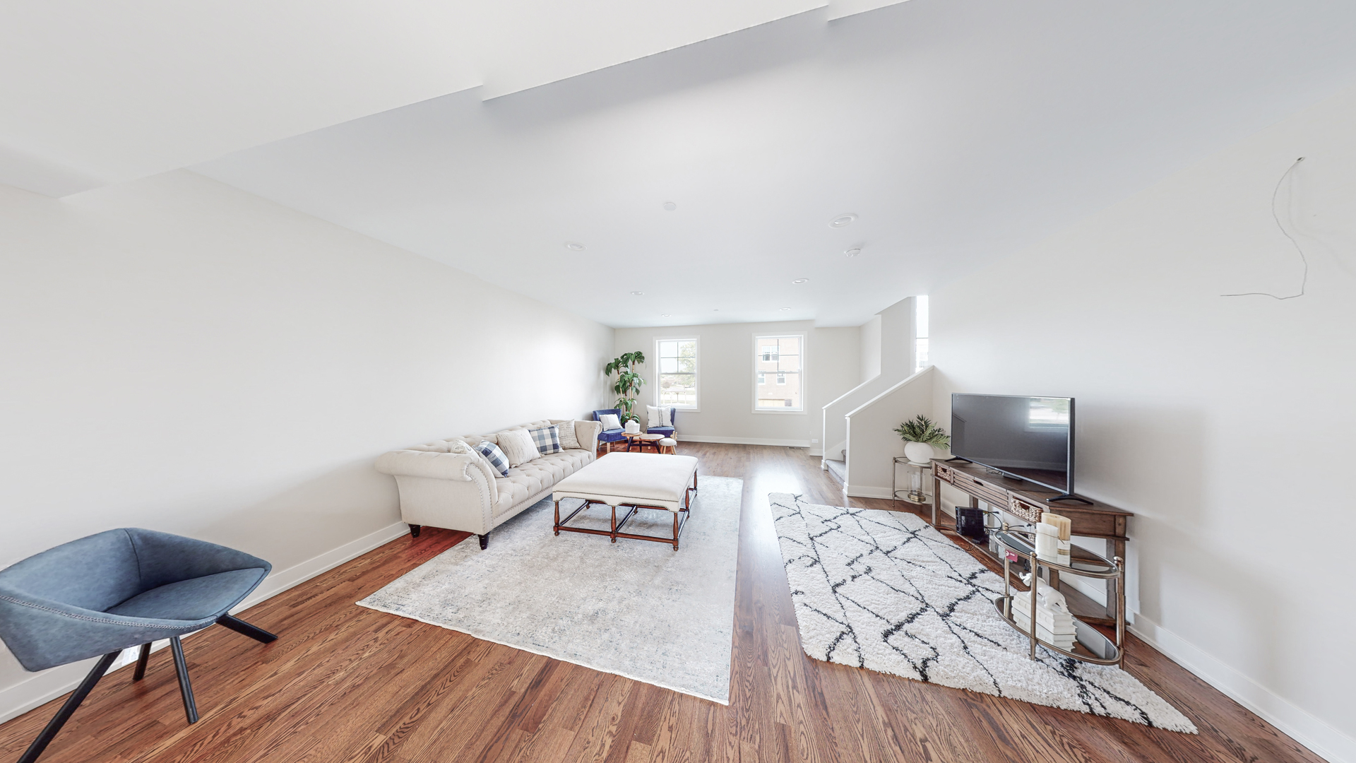 521 Highlands Parkway Itasca, IL 60143 - Photo 12 of 22 a living room with furniture and a flat screen tv