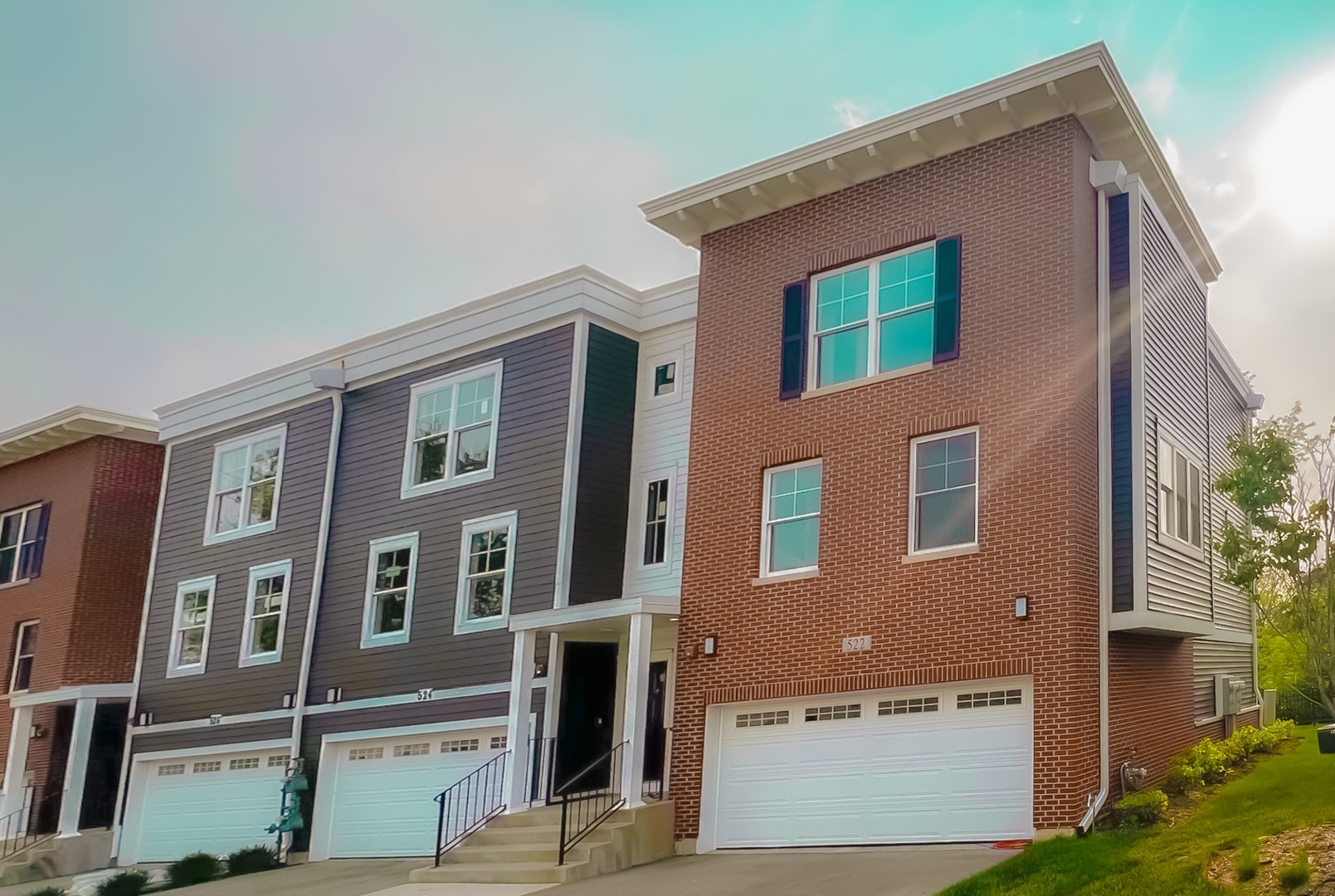 521 Highlands Parkway Itasca, IL 60143 - Photo 2 of 22 a front view of a house with a yard
