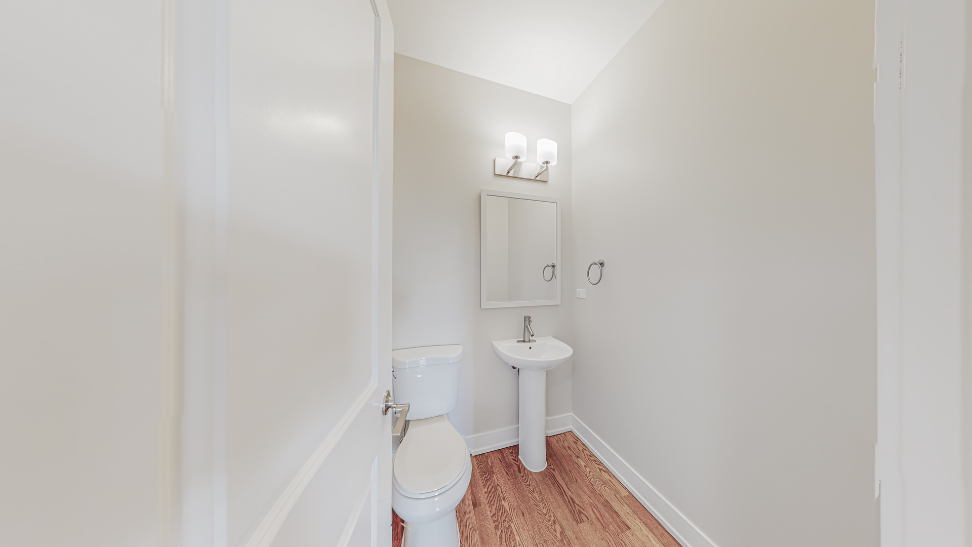 521 Highlands Parkway Itasca, IL 60143 - Photo 22 of 22 a bathroom with a granite countertop toilet and a sink