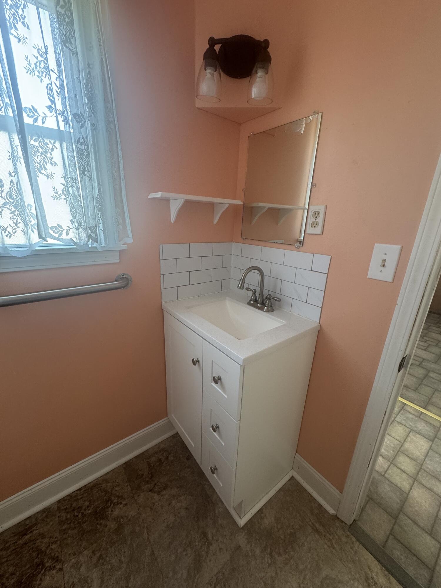 10121 South Sprinkle Road Vicksburg, MI 49097 - Photo 17 of 25 10121 Half Bath2