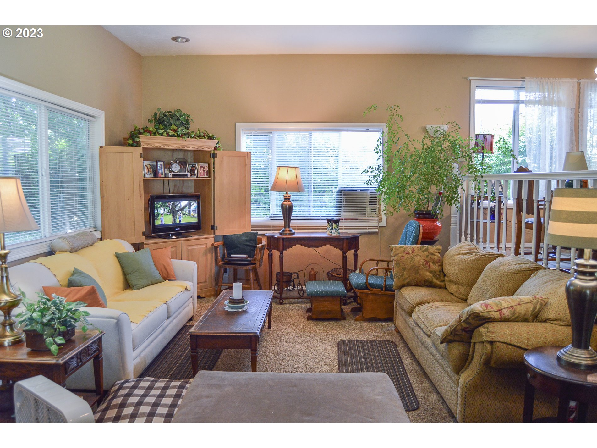 367 Hayden Bridge Way Springfield, OR 97477 - Photo 8 of 16 a living room with furniture and a large window