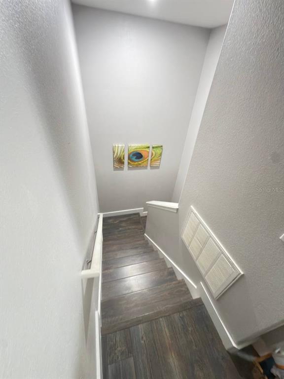1277 Seburn Road Apopka, FL 32703 - Photo 11 of 28 a view of hallway with stairs
