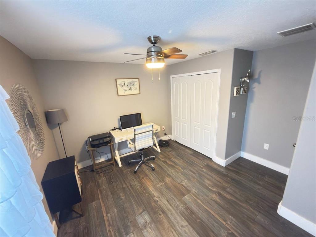 1277 Seburn Road Apopka, FL 32703 - Photo 19 of 28 a living room with furniture and a ceiling fan