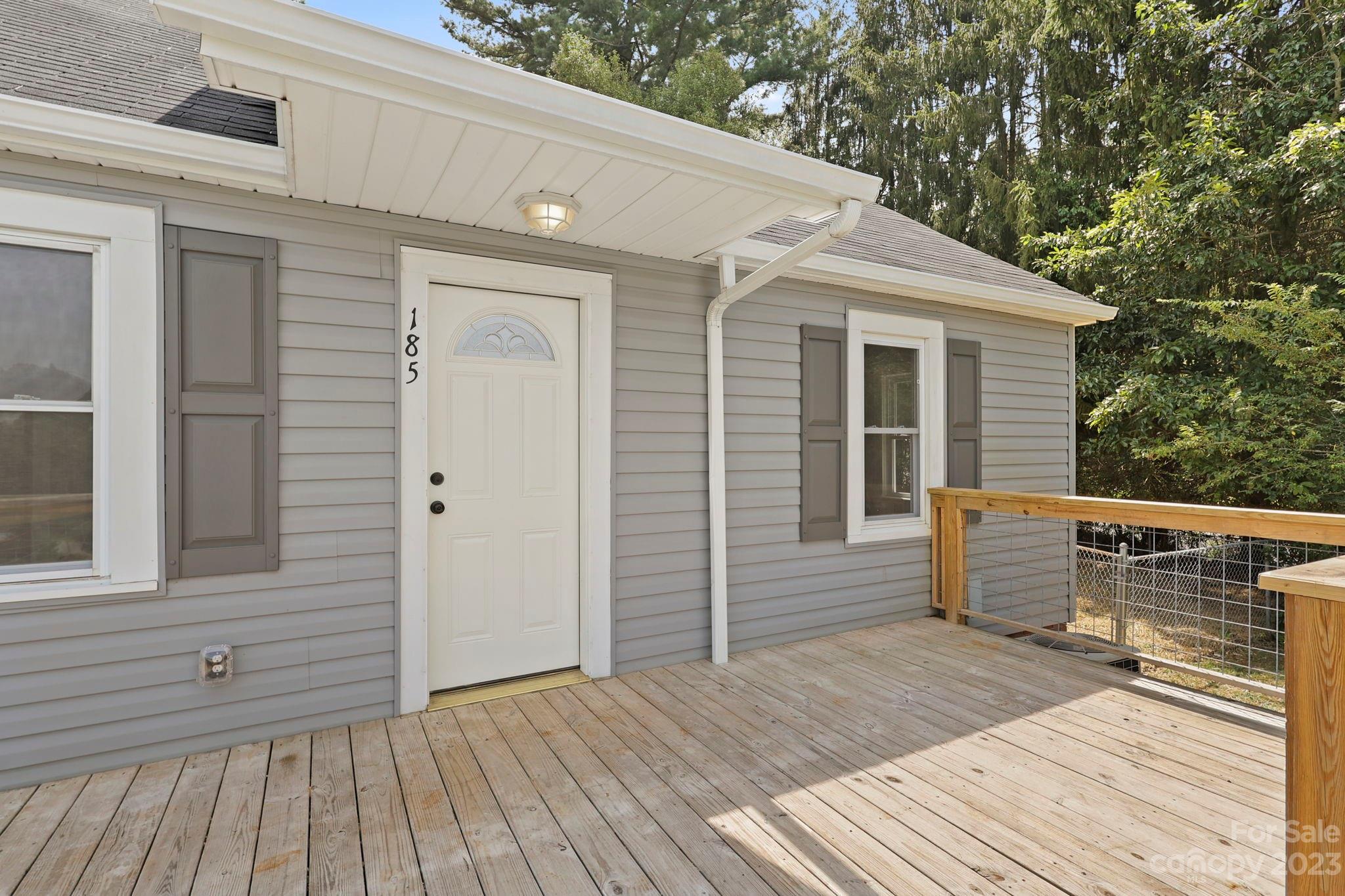 185 Substation Road Canton, NC 28716 - Photo 22 of 32 a view of a wooden deck