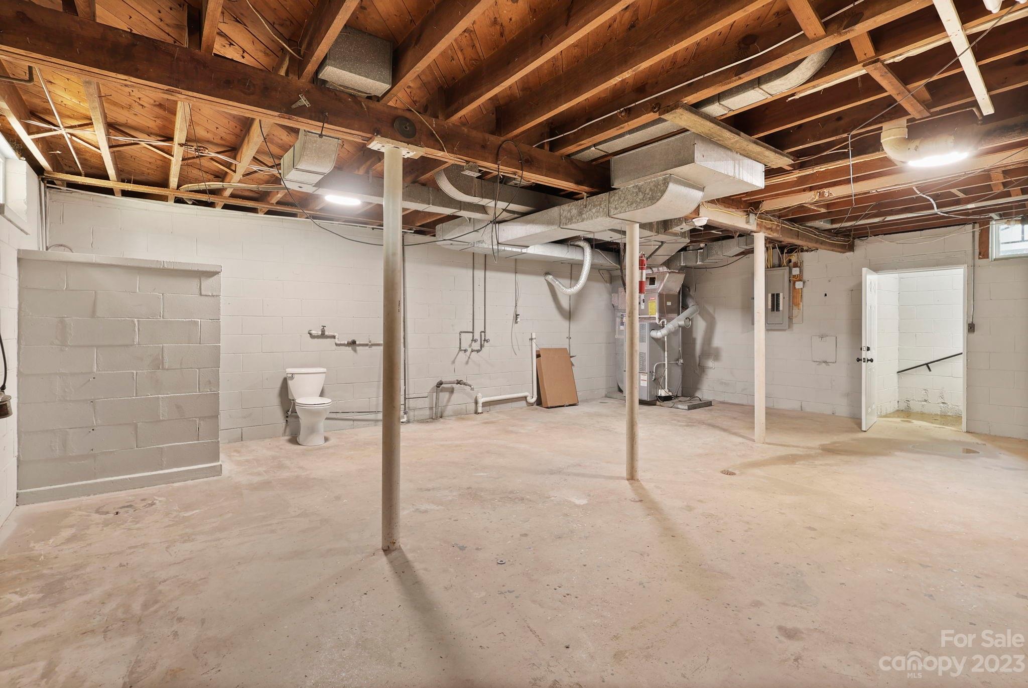 185 Substation Road Canton, NC 28716 - Photo 25 of 32 a view of a room with gym equipment