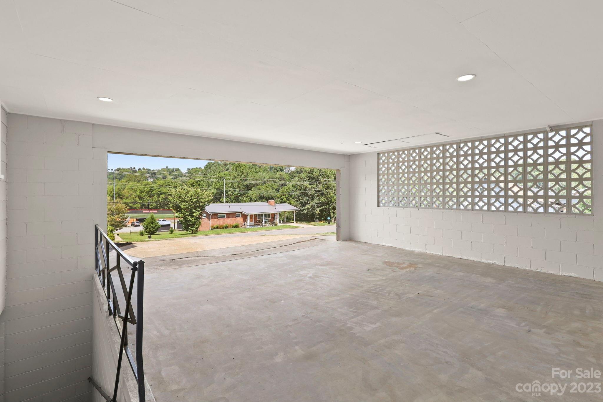 185 Substation Road Canton, NC 28716 - Photo 28 of 32 a very nice looking room with a large window