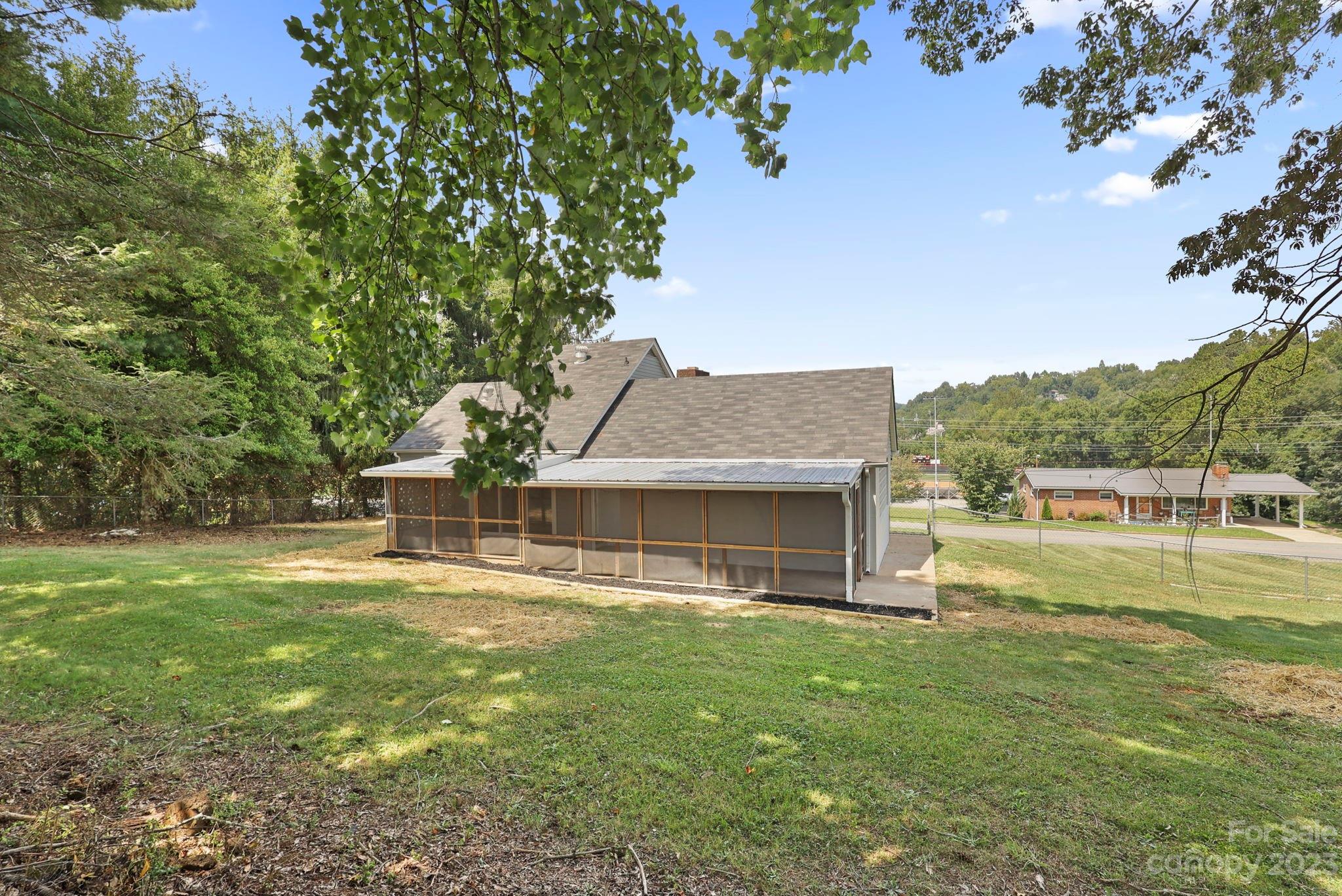 185 Substation Road Canton, NC 28716 - Photo 29 of 32 front view of a house with a yard