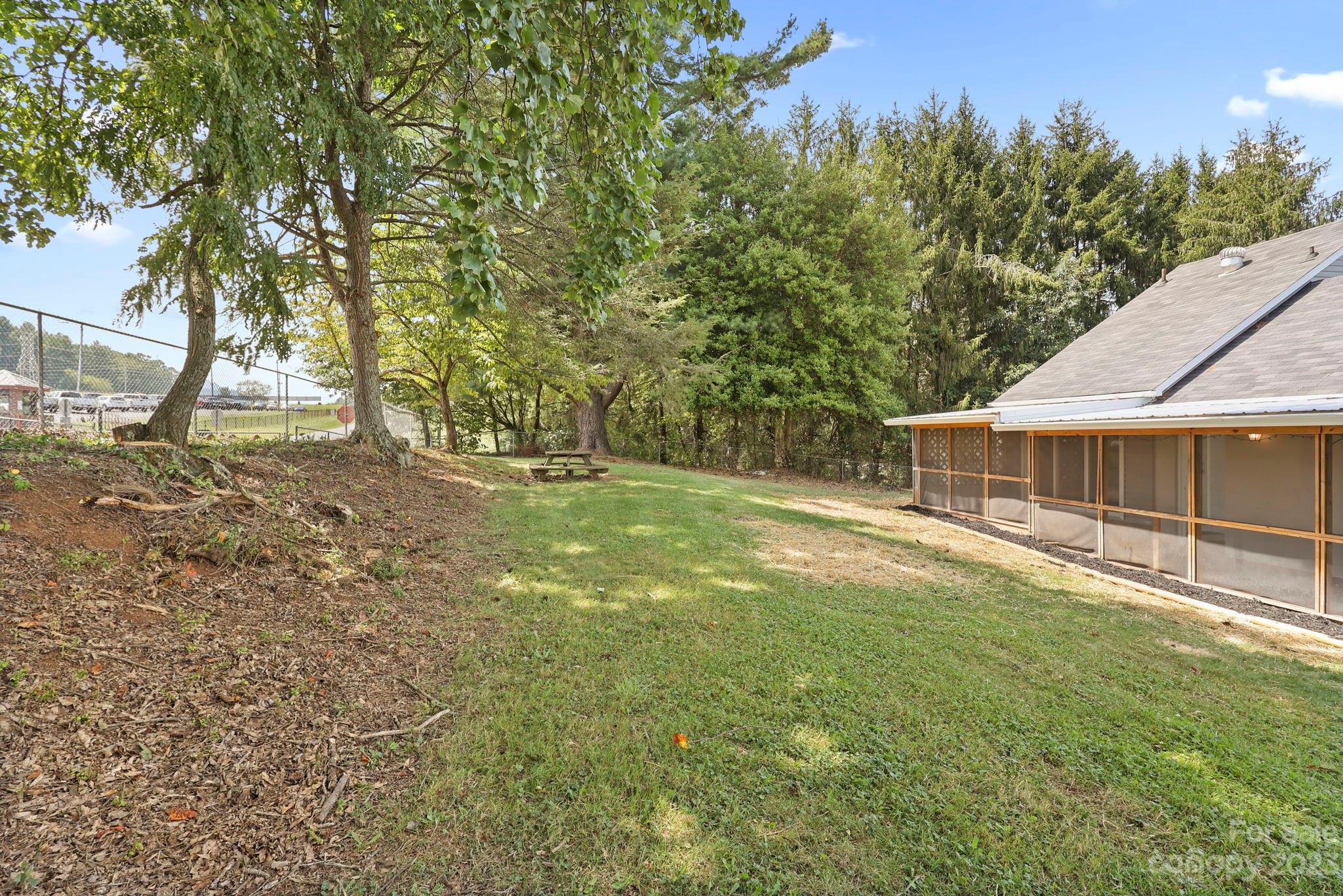 185 Substation Road Canton, NC 28716 - Photo 32 of 32 a view of a house with a yard