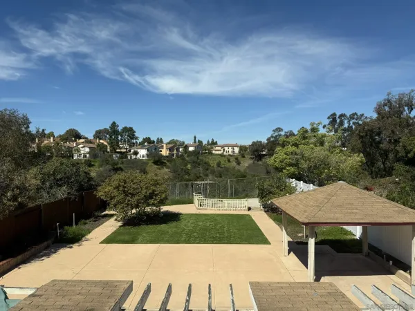 an aerial view of a house having yard