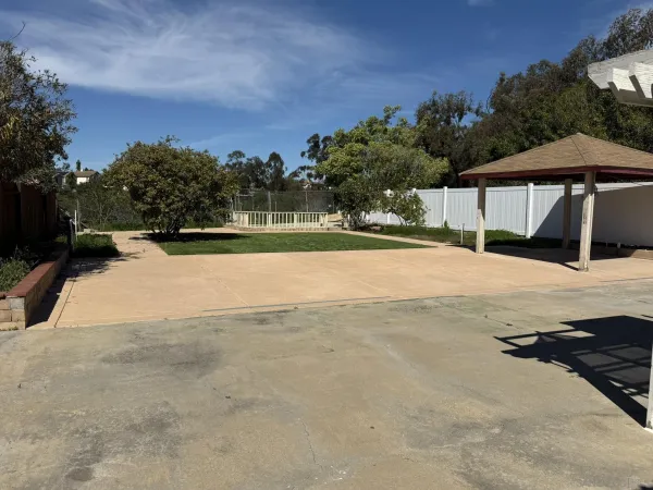 a view of swimming pool outdoor space and yard