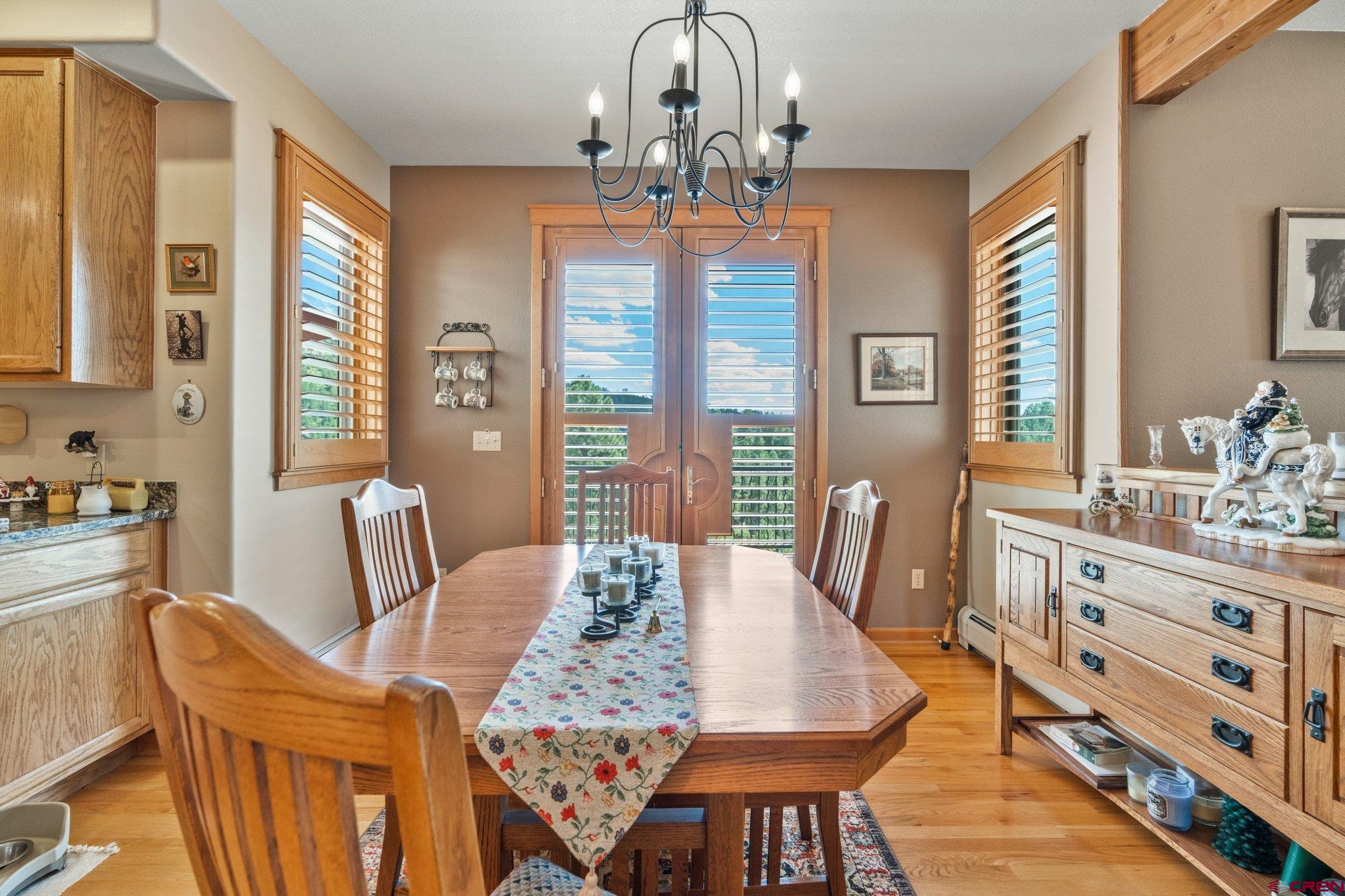 60 Edgemont Way Durango, CO 81301 - Photo 13 of 35 a view of a dining room with furniture window and outside view