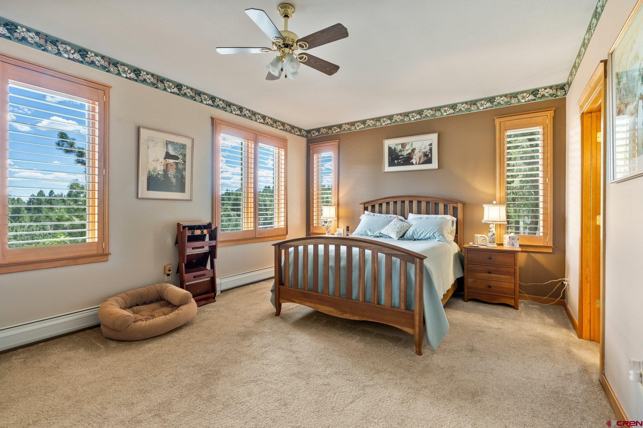 60 Edgemont Way Durango, CO 81301 - Photo 14 of 35 a bedroom with a bed and a window
