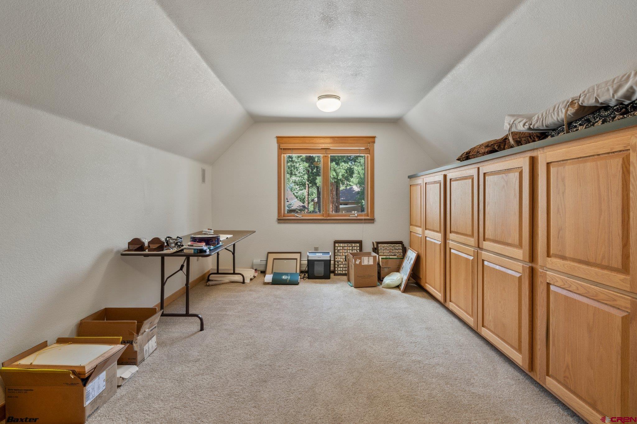 60 Edgemont Way Durango, CO 81301 - Photo 21 of 35 a work room with furniture and a window