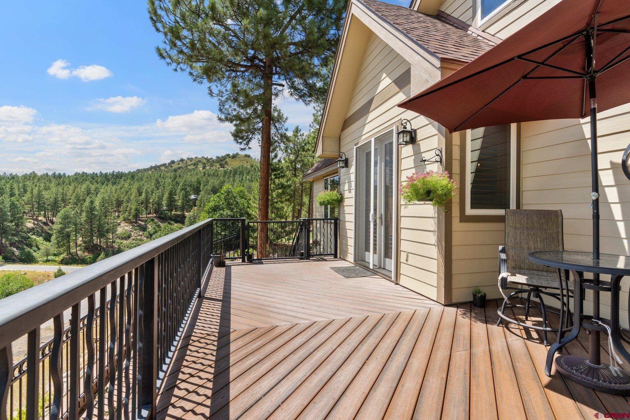 60 Edgemont Way Durango, CO 81301 - Photo 24 of 35 a balcony with wooden floor and outdoor space