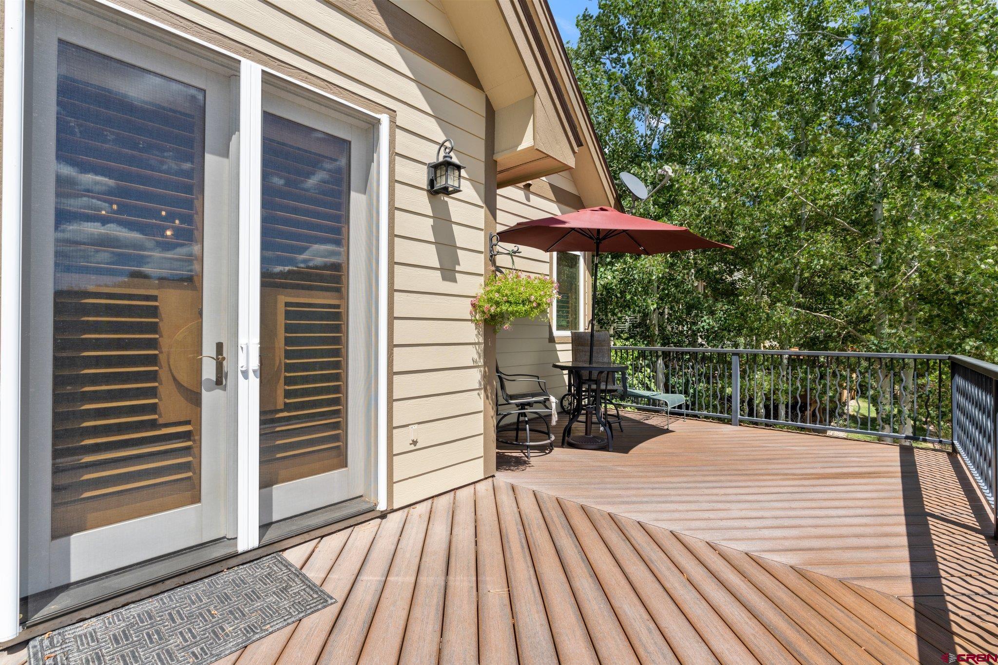 60 Edgemont Way Durango, CO 81301 - Photo 25 of 35 a view of a patio with a table and chairs