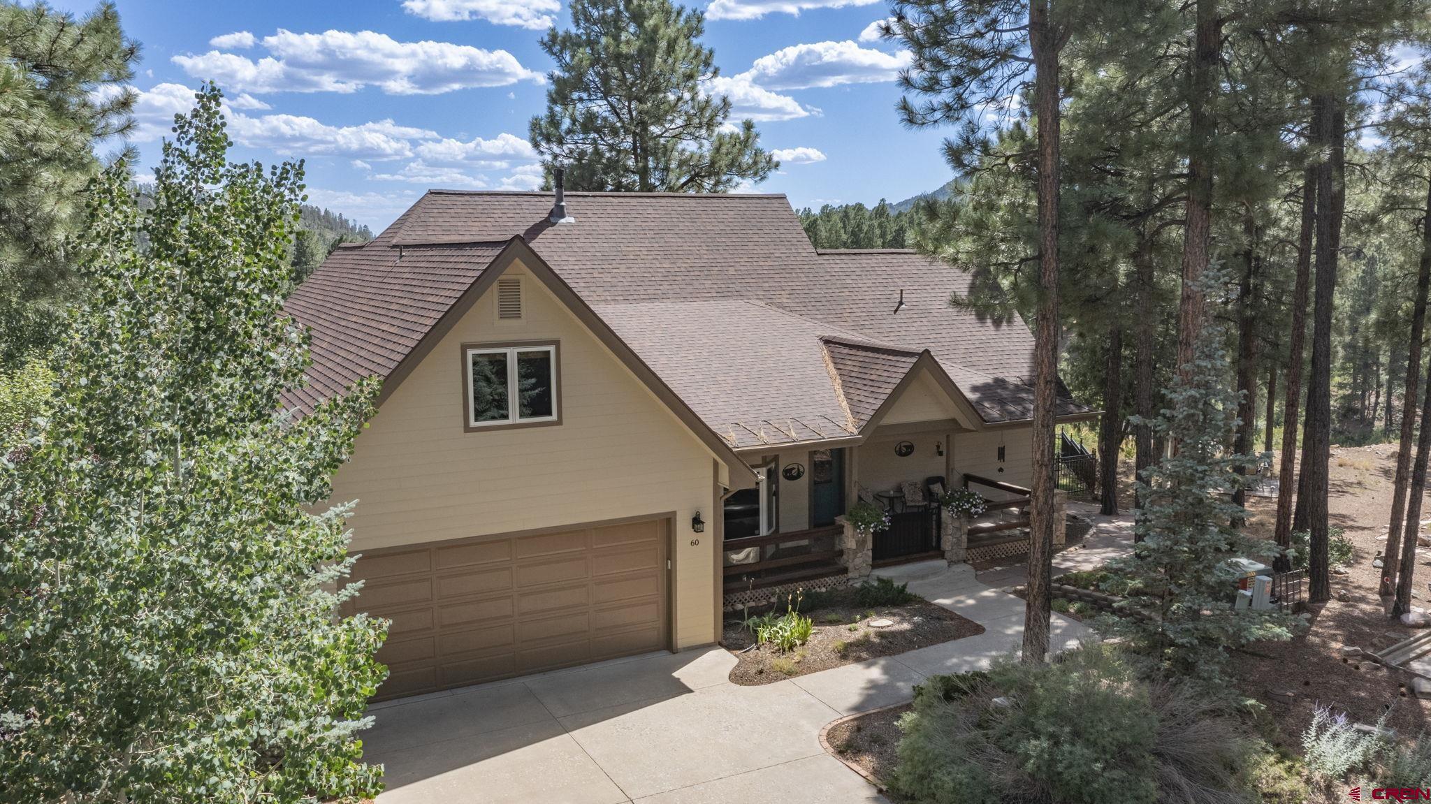 60 Edgemont Way Durango, CO 81301 - Photo 30 of 35 a view of a house with a yard