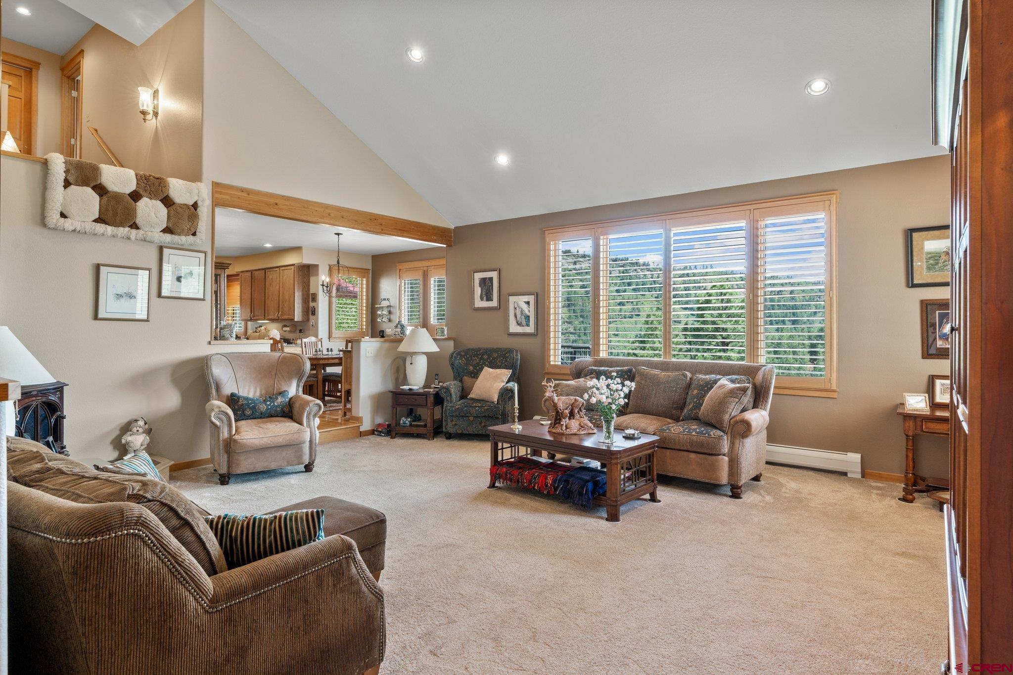 60 Edgemont Way Durango, CO 81301 - Photo 3 of 35 a living room with furniture and large windows