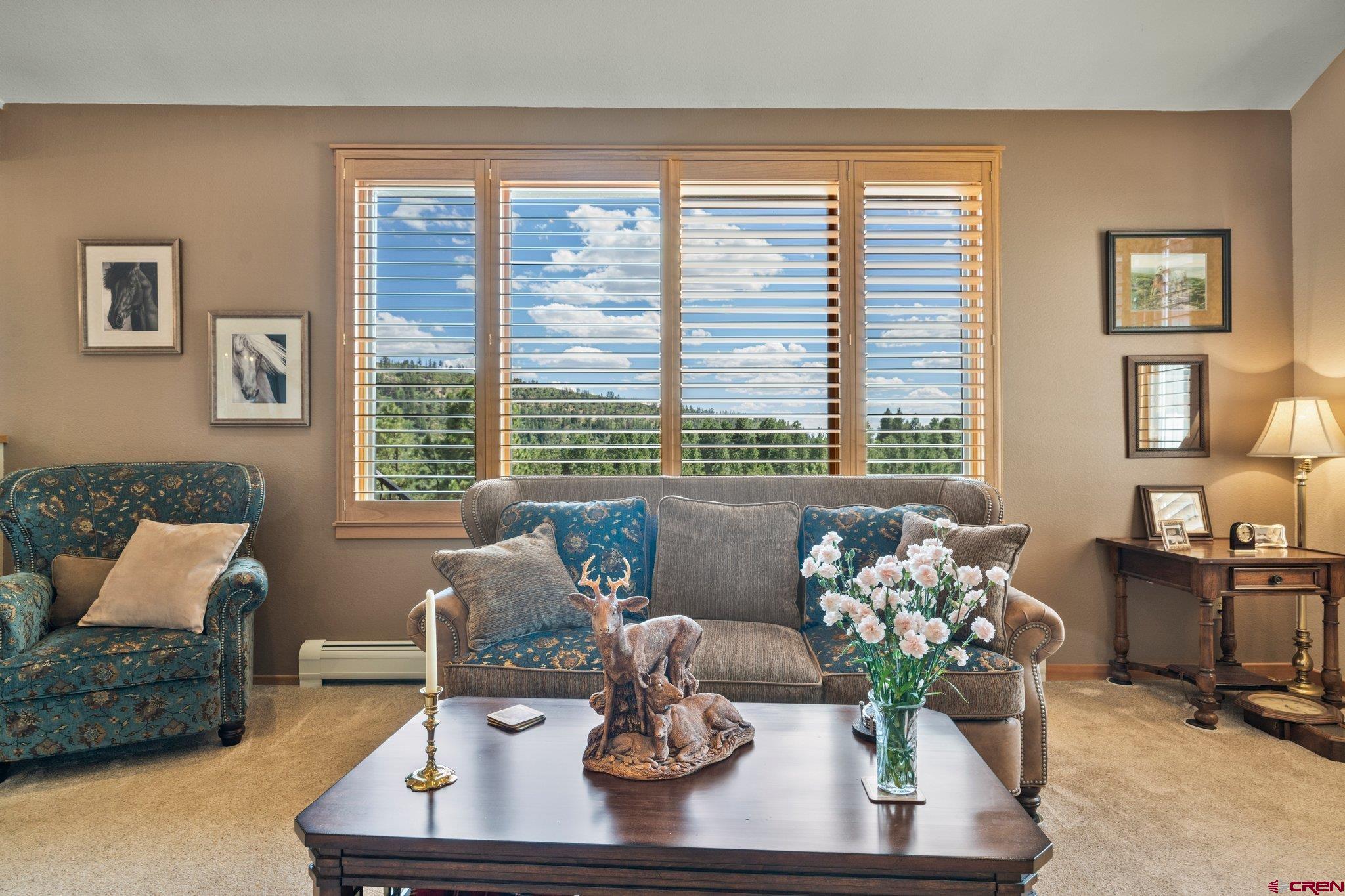 60 Edgemont Way Durango, CO 81301 - Photo 5 of 35 a living room with furniture and large windows