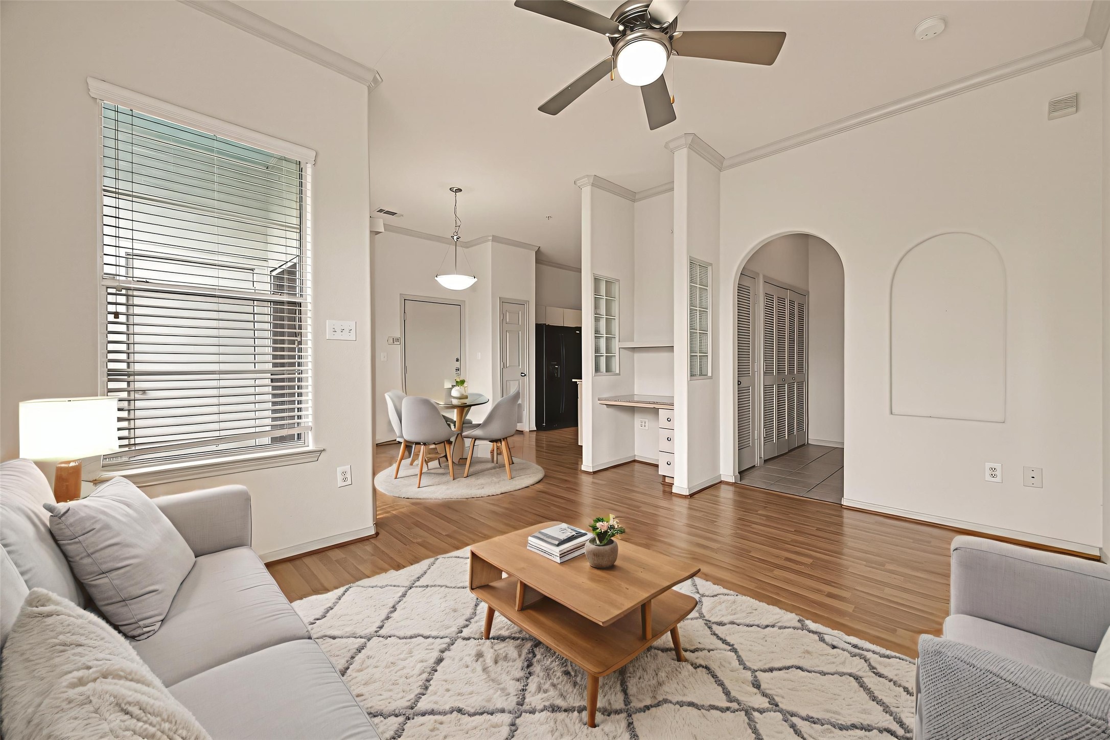 1441 East Street, Unit 308 Houston, TX 77007 - Photo 19 of 42 A gracious flow from one area to the next in this spacious corner unit! This photo is virtually staged to show one possible configuration of furniture.