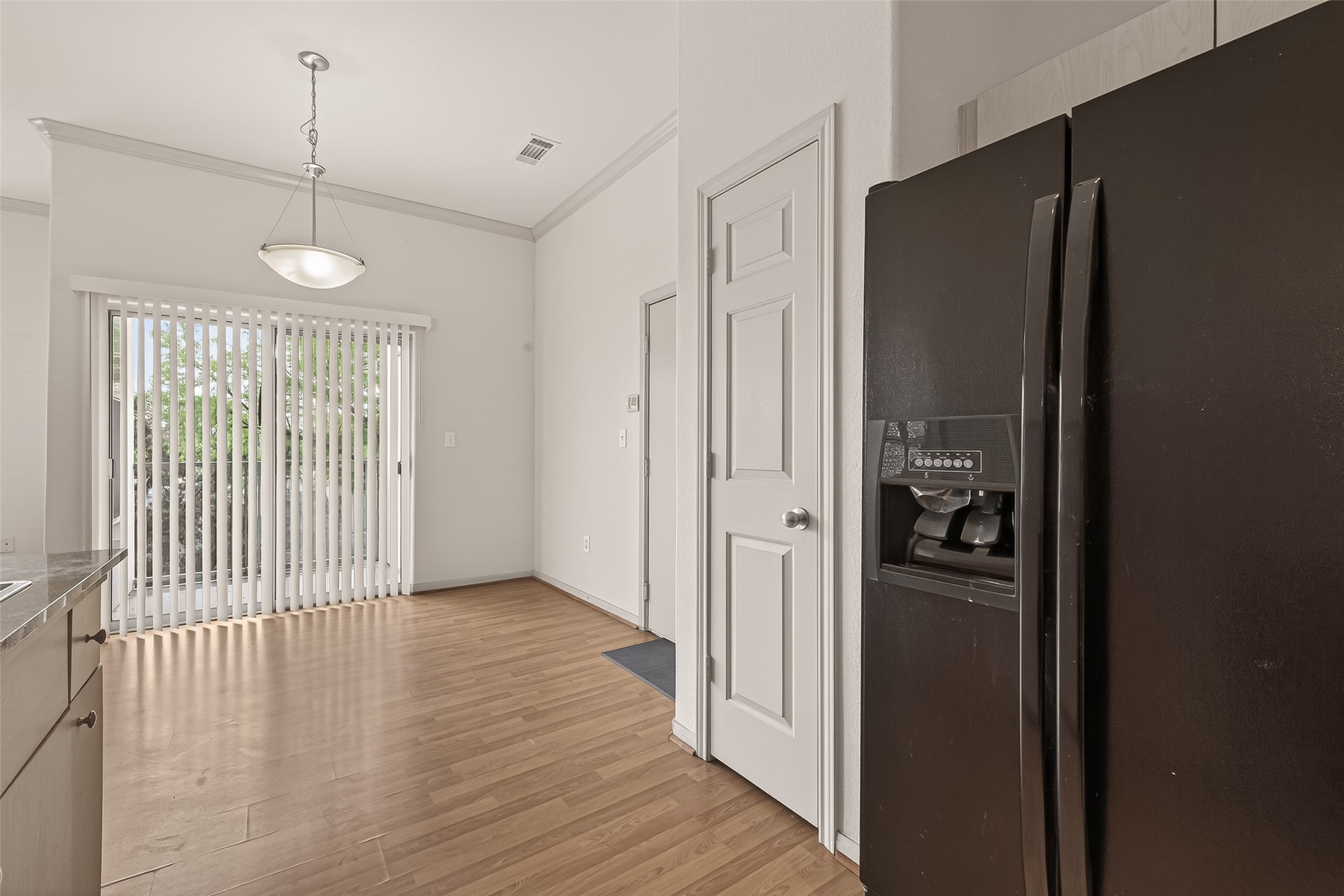 1441 East Street, Unit 308 Houston, TX 77007 - Photo 26 of 42 Refrigerator, breakfast space, pantry and balcony - what else do you need?