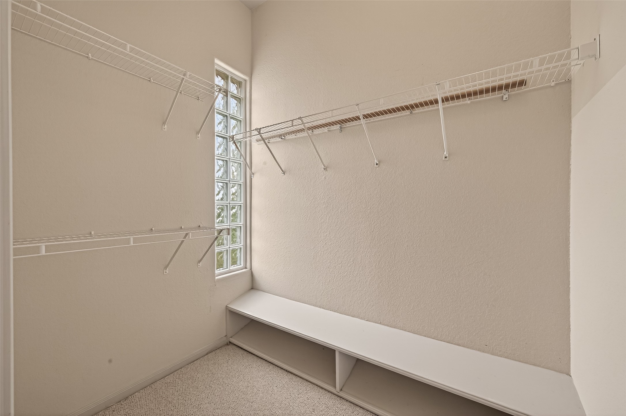 1441 East Street, Unit 308 Houston, TX 77007 - Photo 10 of 42 Large walk-in closet with built-in shelving.