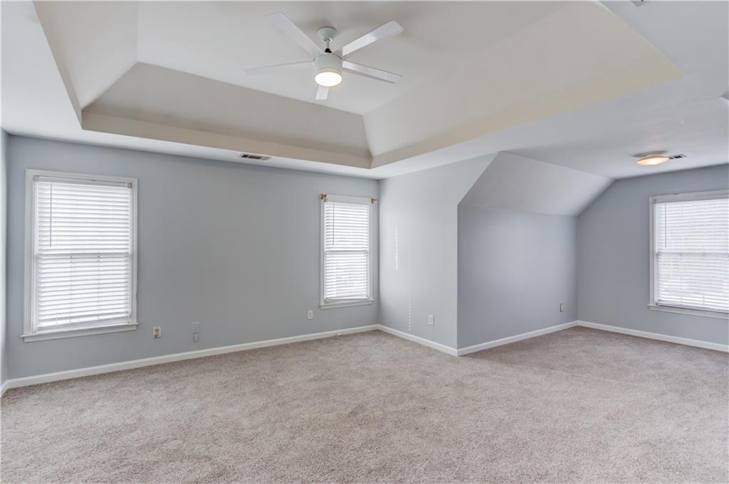 1446 Chadwick Ridge Court Lawrenceville, GA 30043 - Photo 21 of 54 a view of an empty room with a window