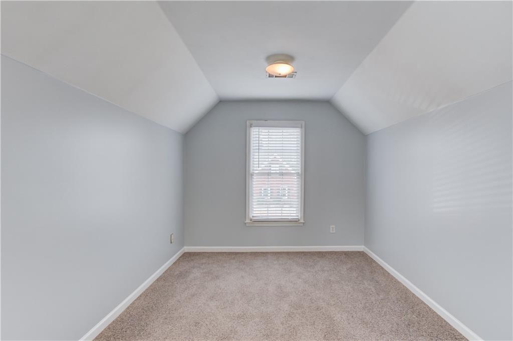 1446 Chadwick Ridge Court Lawrenceville, GA 30043 - Photo 22 of 54 an empty room with a window
