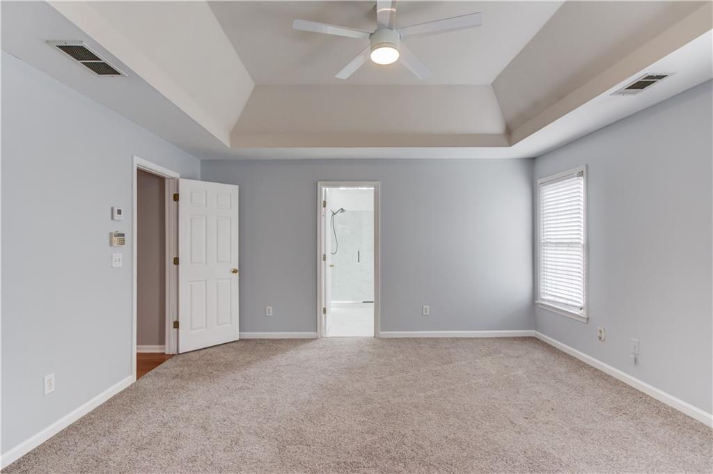 1446 Chadwick Ridge Court Lawrenceville, GA 30043 - Photo 23 of 54 a view of an empty room with a window