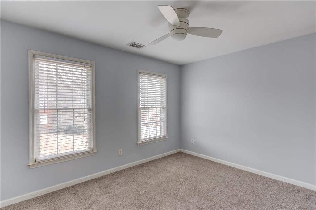 1446 Chadwick Ridge Court Lawrenceville, GA 30043 - Photo 31 of 54 a view of an empty room with a window