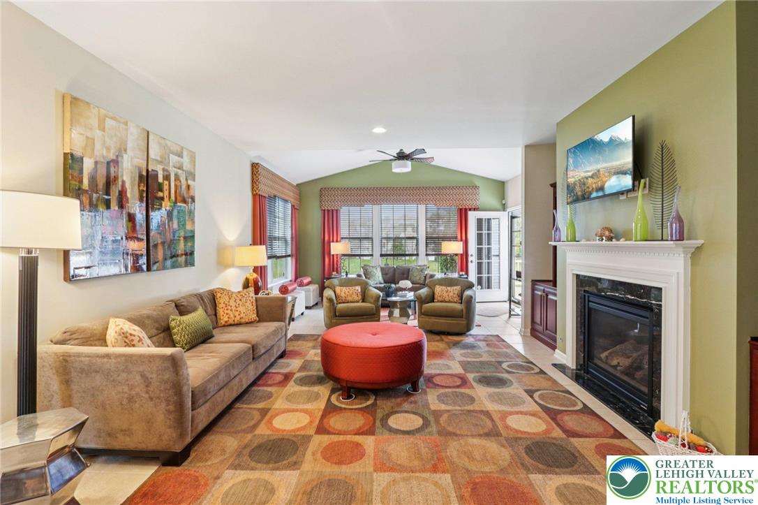 2113 Kingsview Road Lower Macungie Township, PA 18062 - Photo 21 of 62 a living room with fireplace furniture and a fireplace