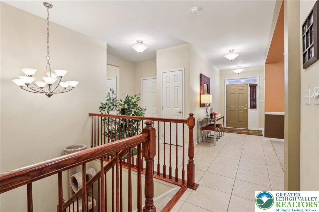 2113 Kingsview Road Lower Macungie Township, PA 18062 - Photo 33 of 62 a view of a hallway with dining area