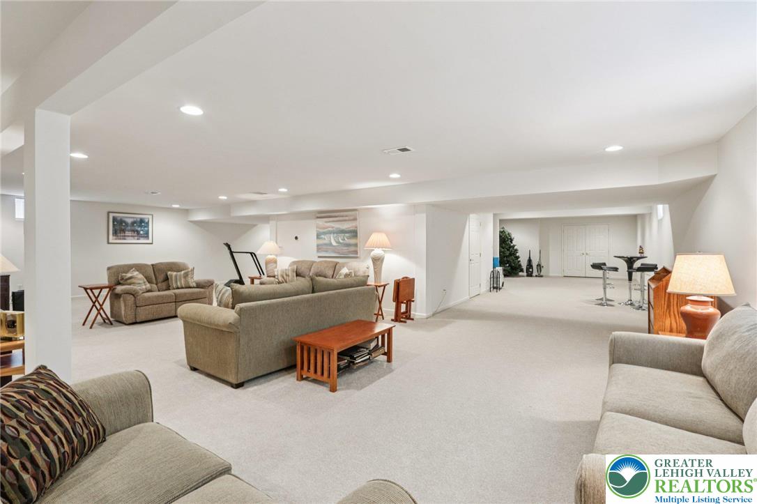 2113 Kingsview Road Lower Macungie Township, PA 18062 - Photo 36 of 62 a living room with furniture and view of kitchen