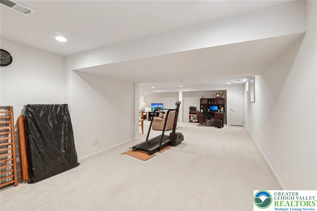 2113 Kingsview Road Lower Macungie Township, PA 18062 - Photo 40 of 62 a view of a room with gym equipment