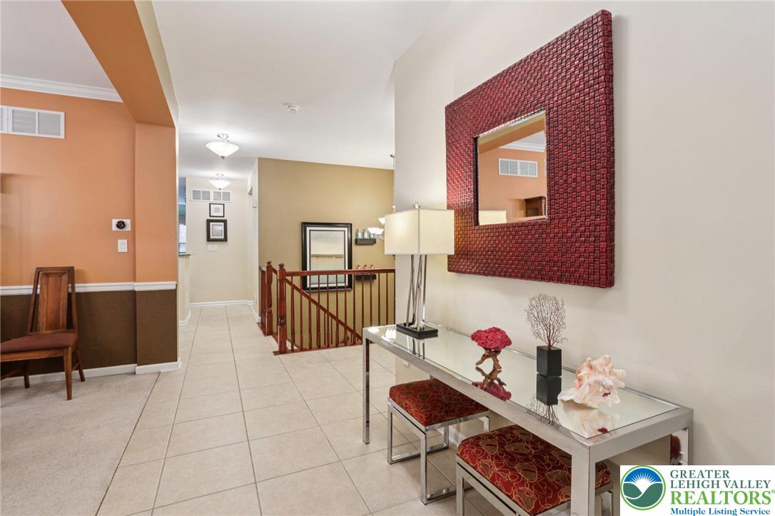 2113 Kingsview Road Lower Macungie Township, PA 18062 - Photo 5 of 62 a en suite bathroom with a double vanity sink mirror and tub