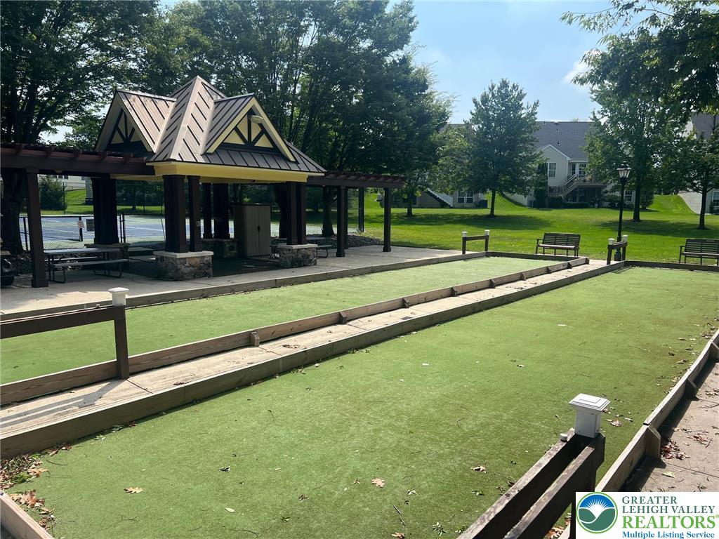 2113 Kingsview Road Lower Macungie Township, PA 18062 - Photo 54 of 62 a view of a big house with a big yard and sitting area