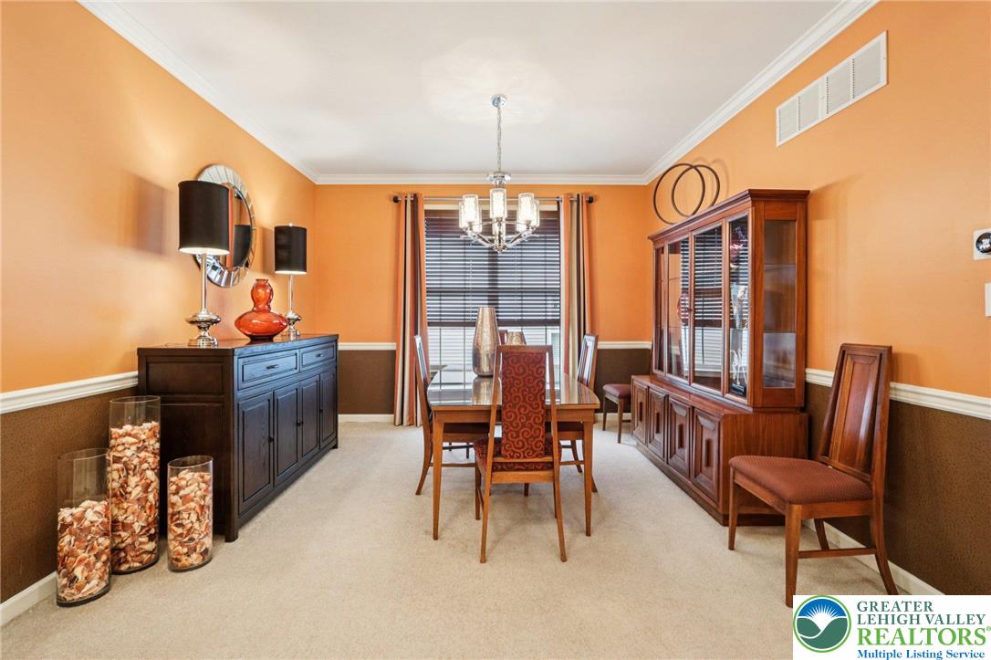 2113 Kingsview Road Lower Macungie Township, PA 18062 - Photo 6 of 62 a dining room with furniture and window