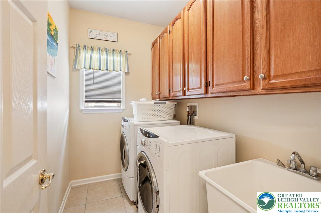 2113 Kingsview Road Lower Macungie Township, PA 18062 - Photo 9 of 62 a utility room with dryer and washer