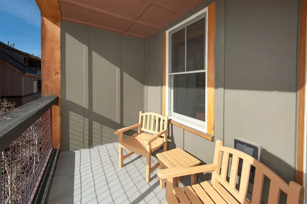 a view of a patio with swimming pool