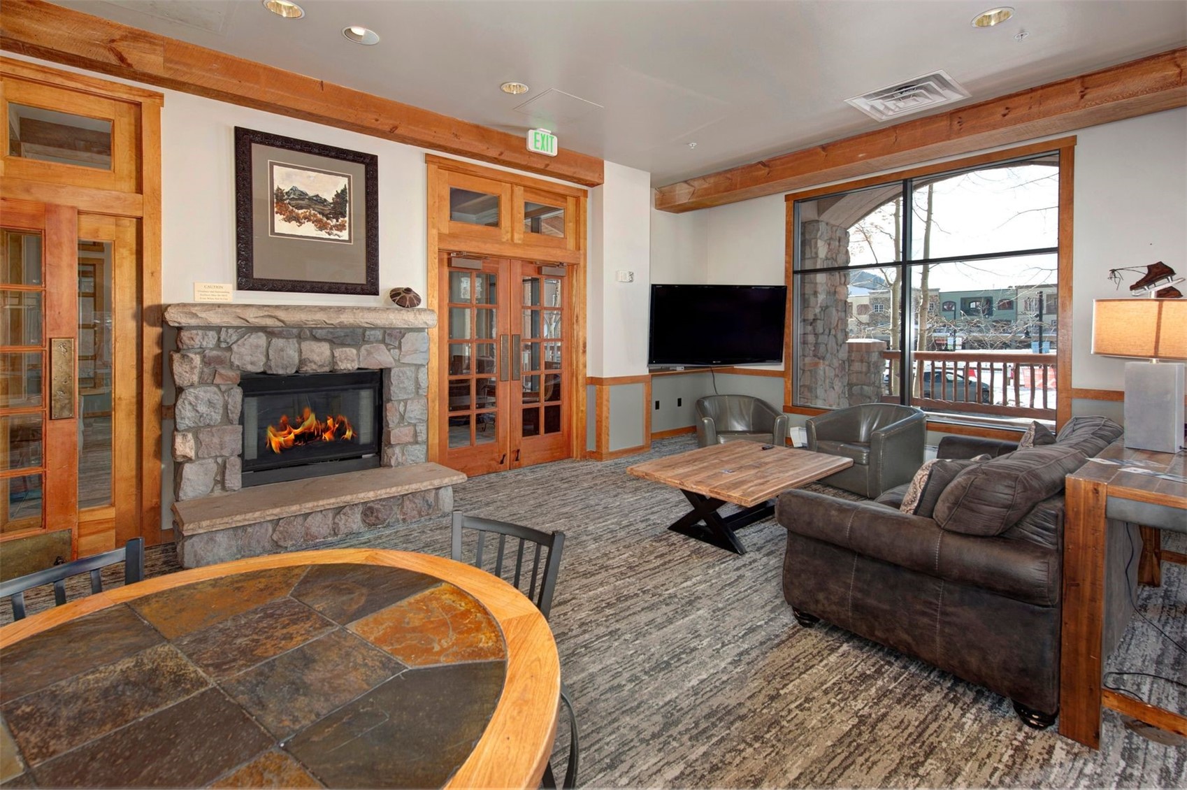 100 Dercum Square, Unit 8371 Keystone, CO 80435 - Photo 27 of 33 a living room with furniture and a fireplace