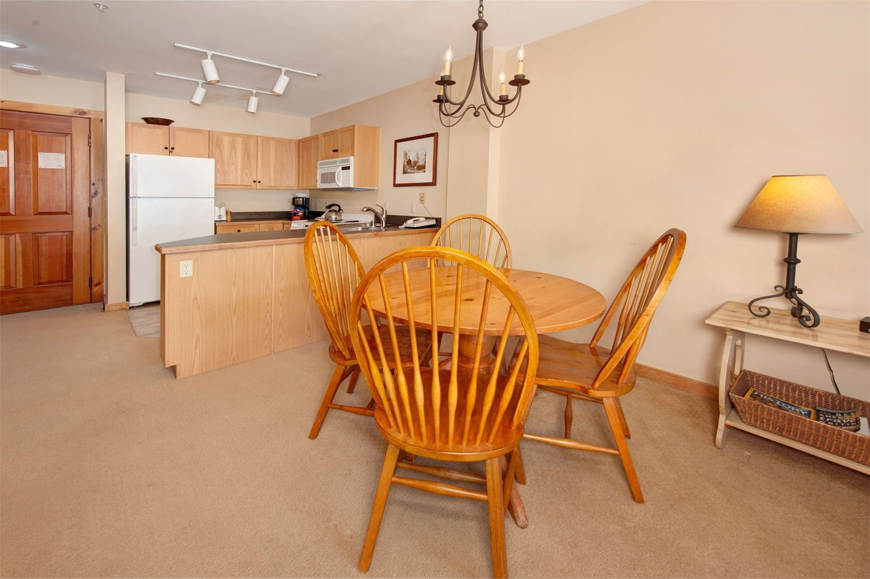 100 Dercum Square, Unit 8371 Keystone, CO 80435 - Photo 10 of 33 a dining room with furniture and chandelier