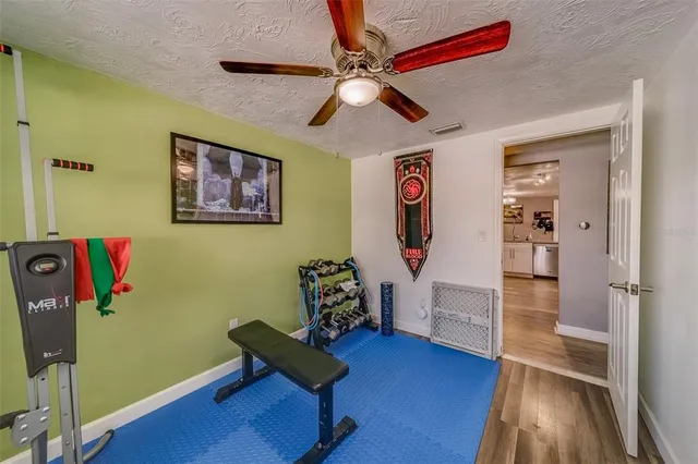 a view of a swimming pool with a patio